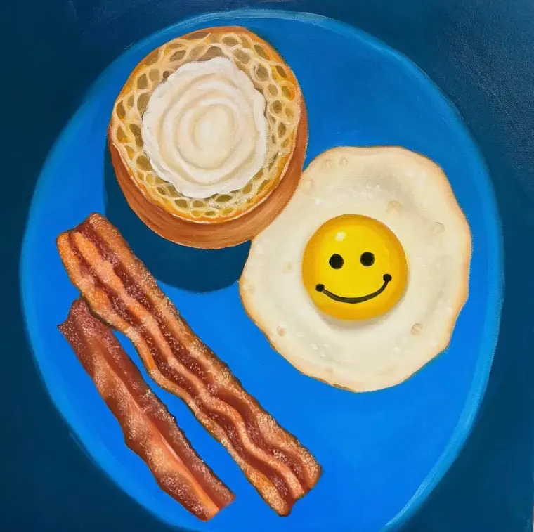 Oil painting of a blue plate with a smiling fried egg, two strips of bacon and a muffin topped with cream, 20 × 20 in
